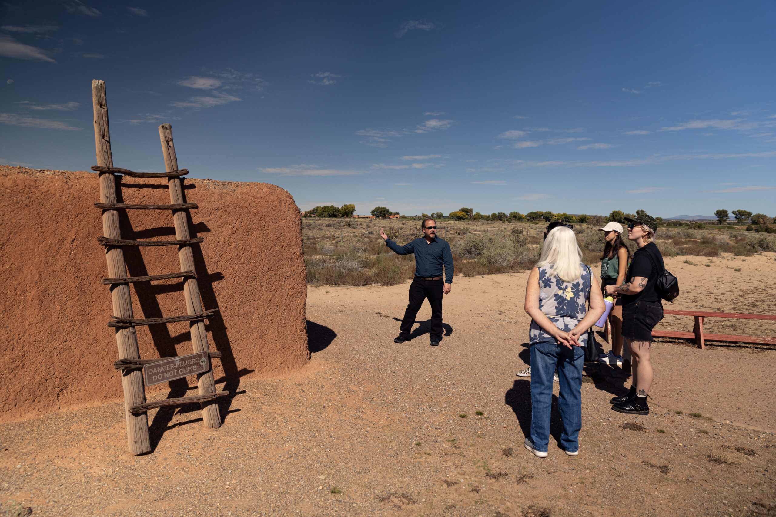 Coronado TiraHowardPhoto_GI9A2342 Volunteer showing a adobe structure and ladder